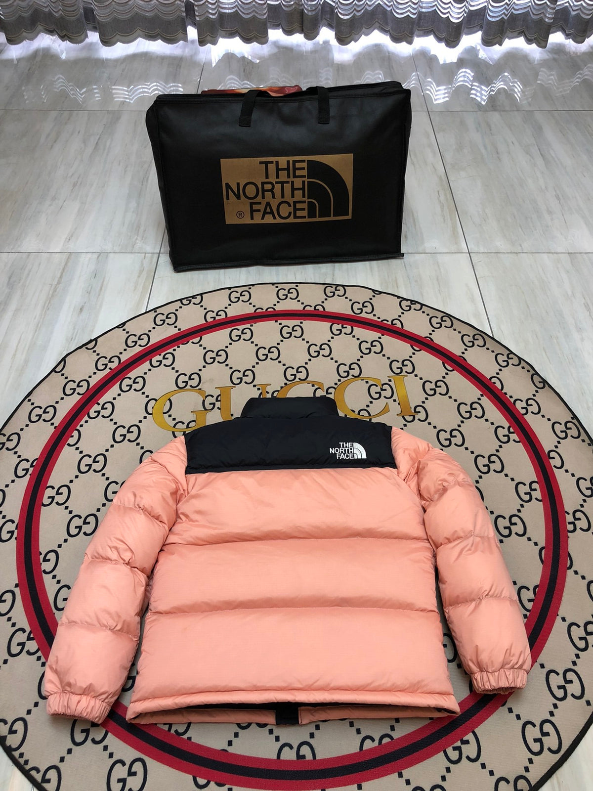 The North Face Peach Pink and Black Color-Block Puffer Jacket