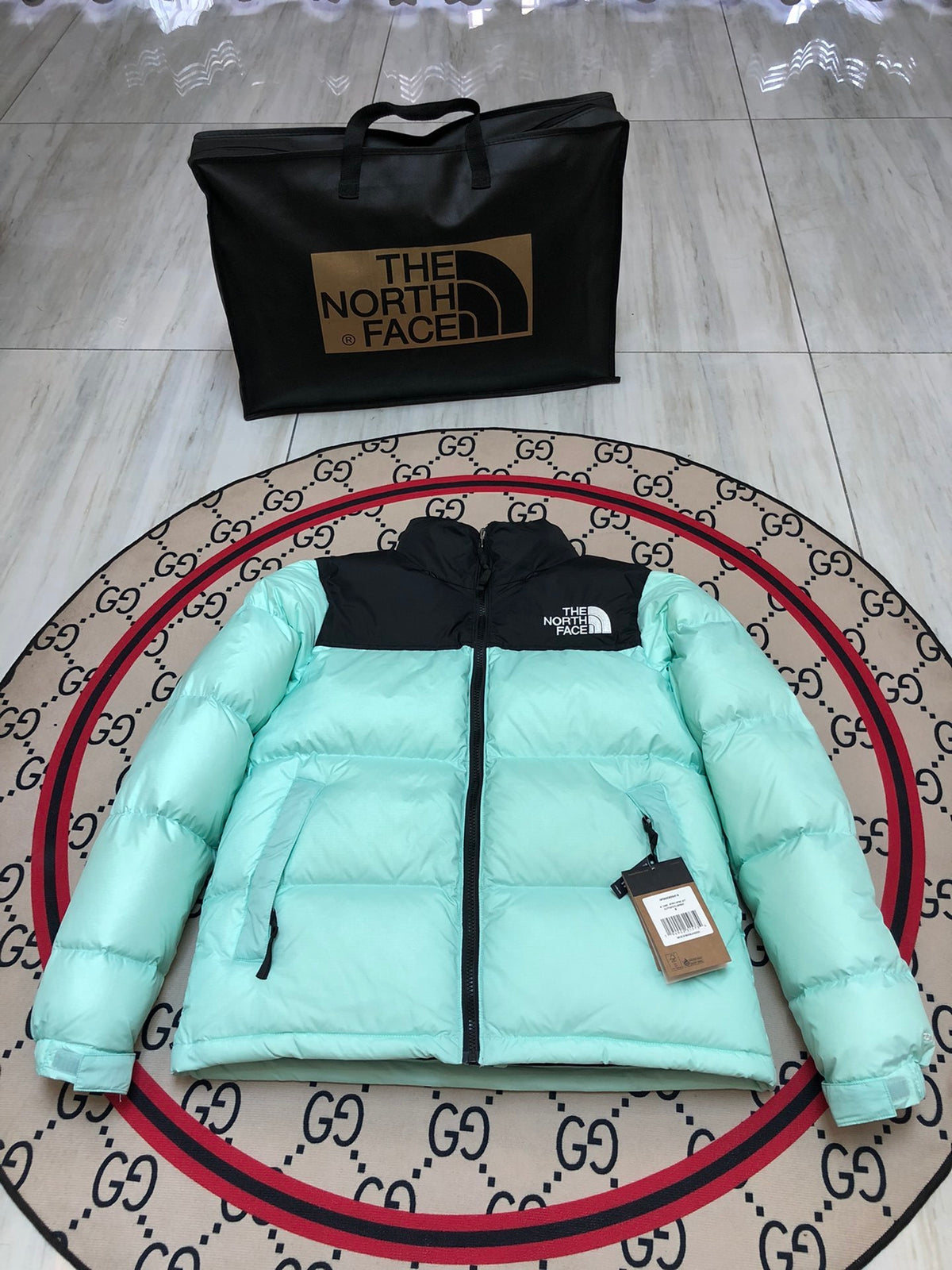 The North Face Mint Green and Black Color-Block Puffer Jacket