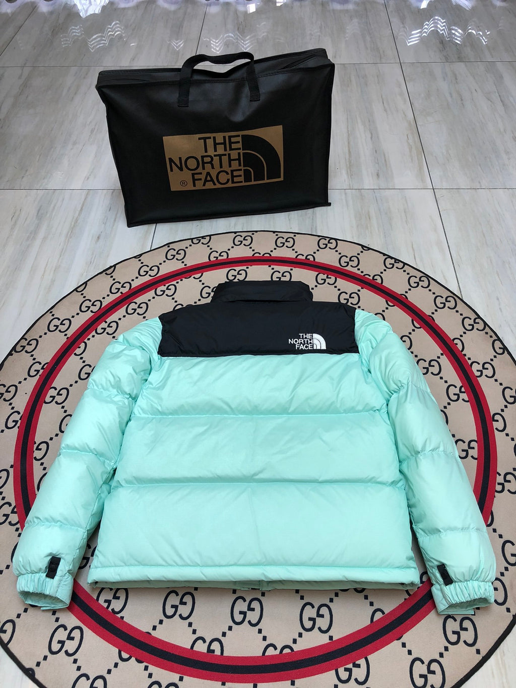 The North Face Mint Green and Black Color-Block Puffer Jacket