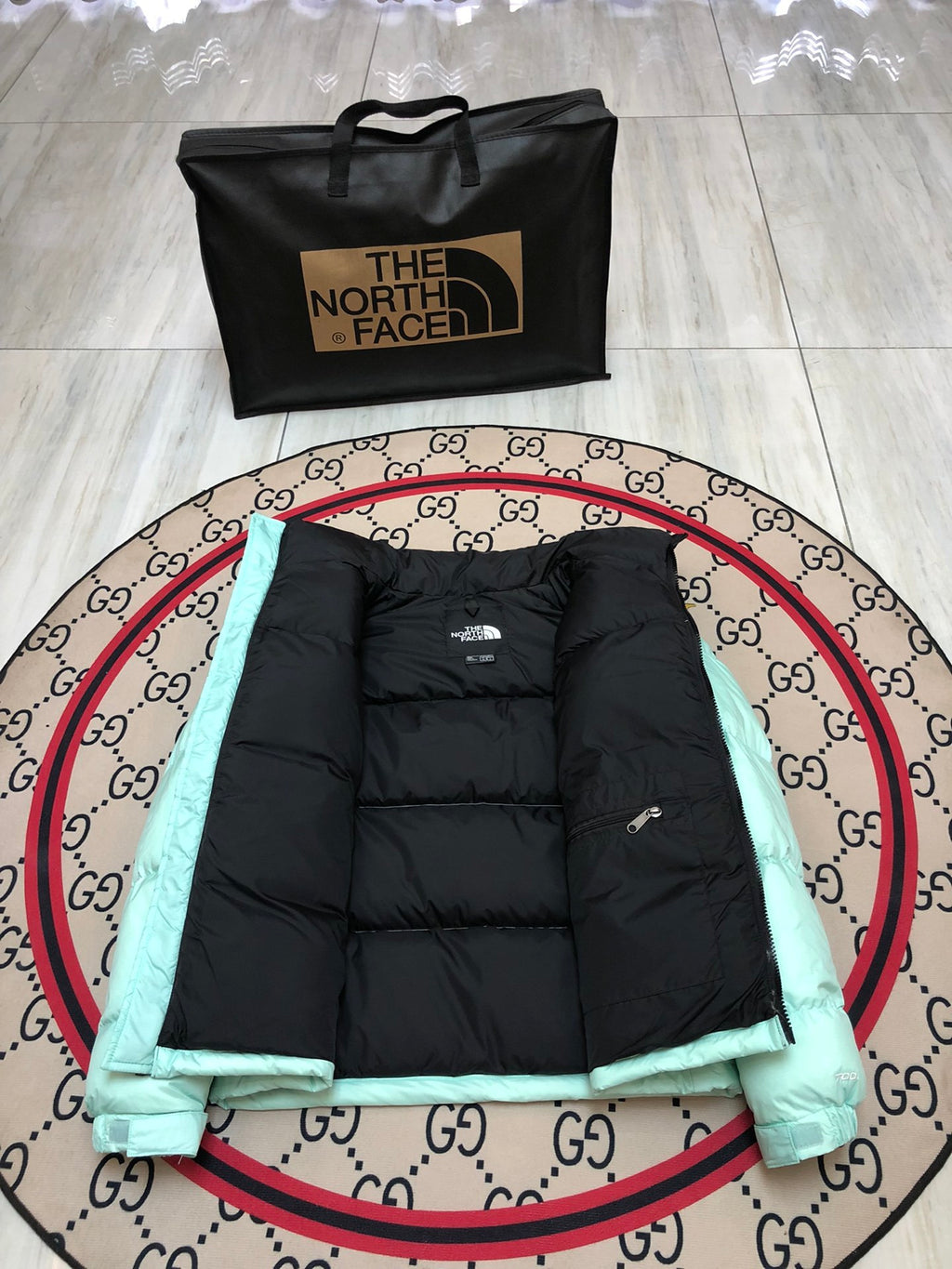 The North Face Mint Green and Black Color-Block Puffer Jacket