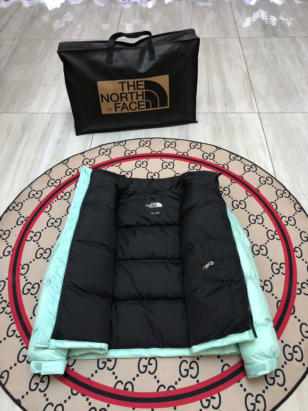 The North Face Mint Green and Black Color-Block Puffer Jacket