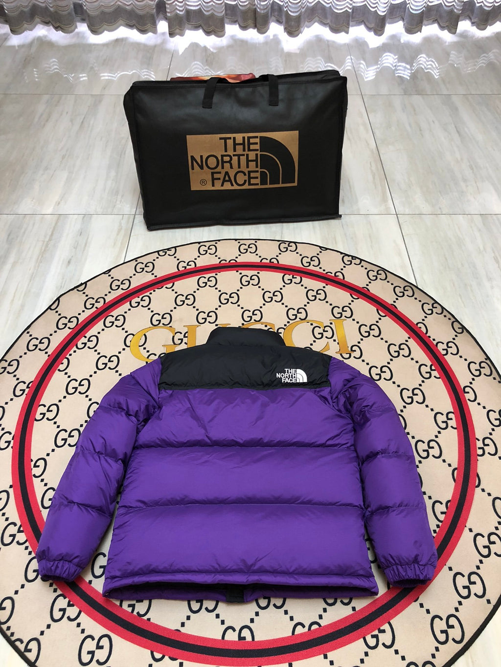 The North Face Purple and Black Stand-Collar Puffer Jacket