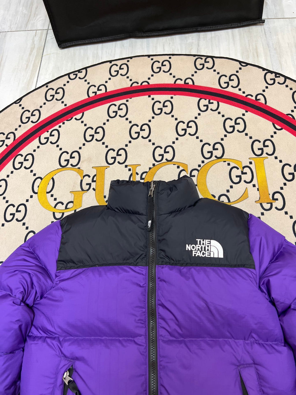 The North Face Purple and Black Stand-Collar Puffer Jacket
