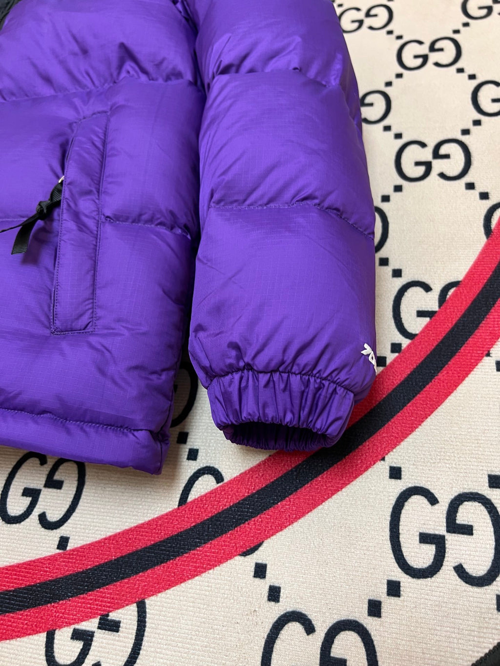 The North Face Purple and Black Stand-Collar Puffer Jacket