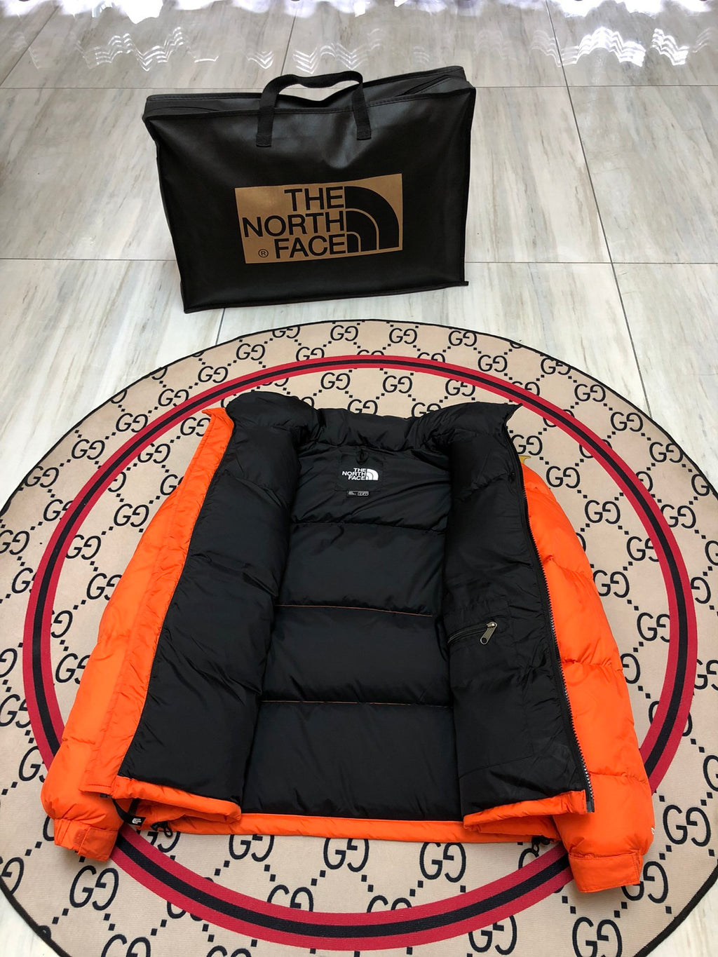 The North Face Orange and Black Color-Block Puffer Jacket