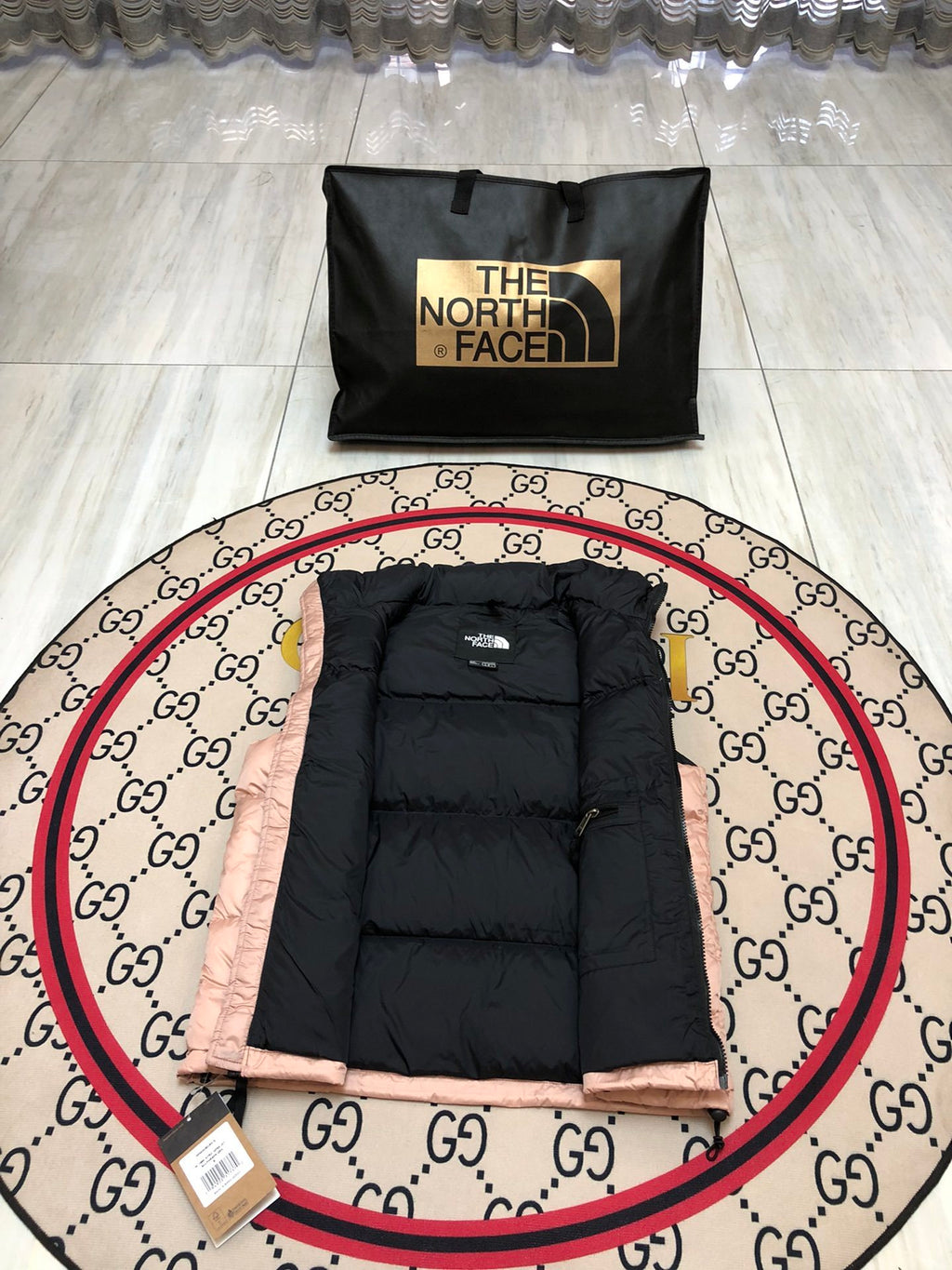 The North Face Blush Pink and Black Colorblock Puffer Vest