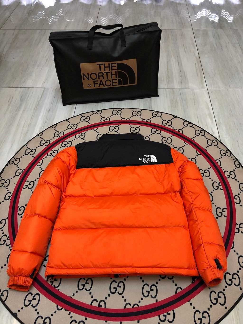 The North Face Orange and Black Color-Block Puffer Jacket