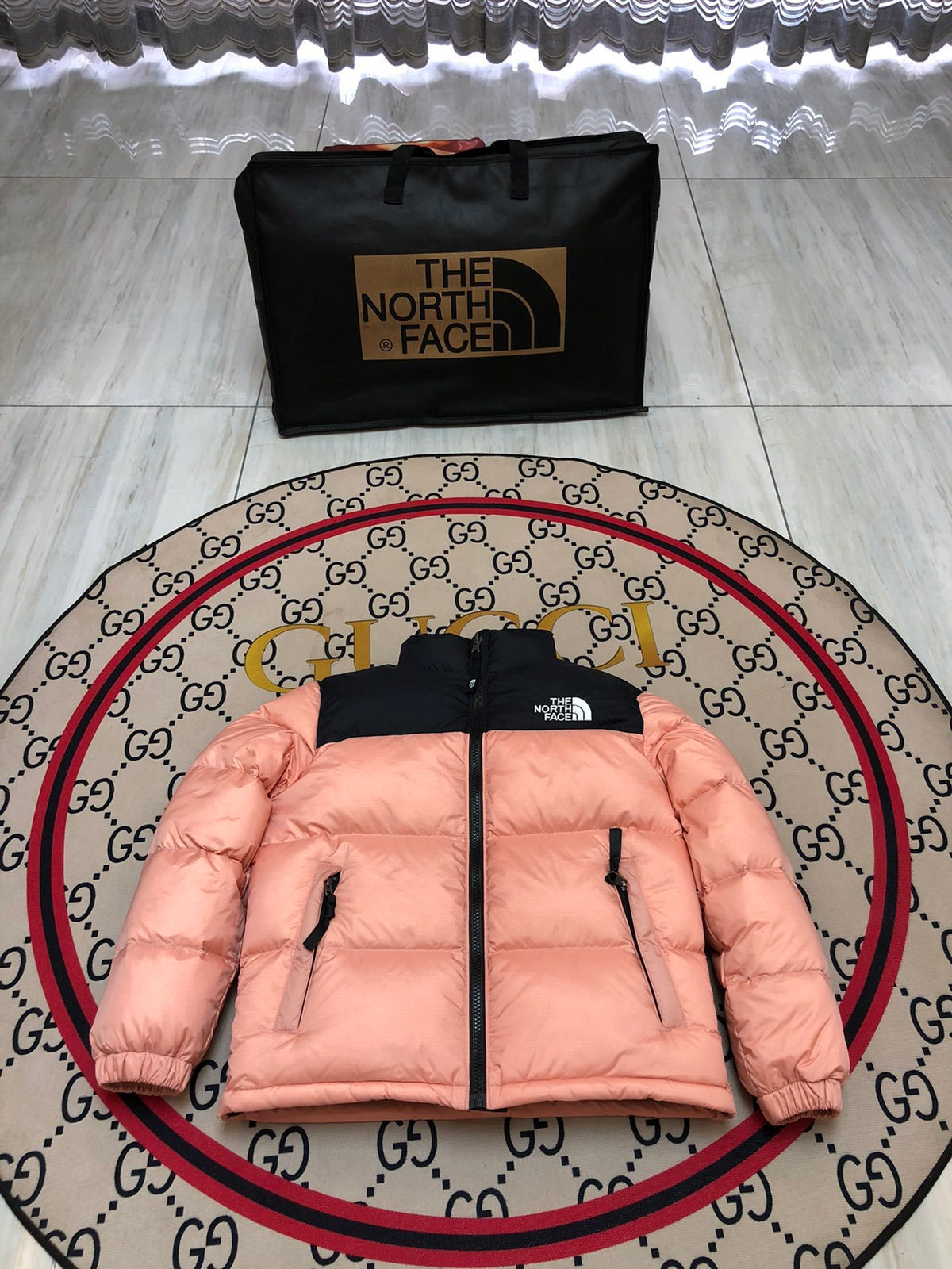 The North Face Peach Pink and Black Color-Block Puffer Jacket