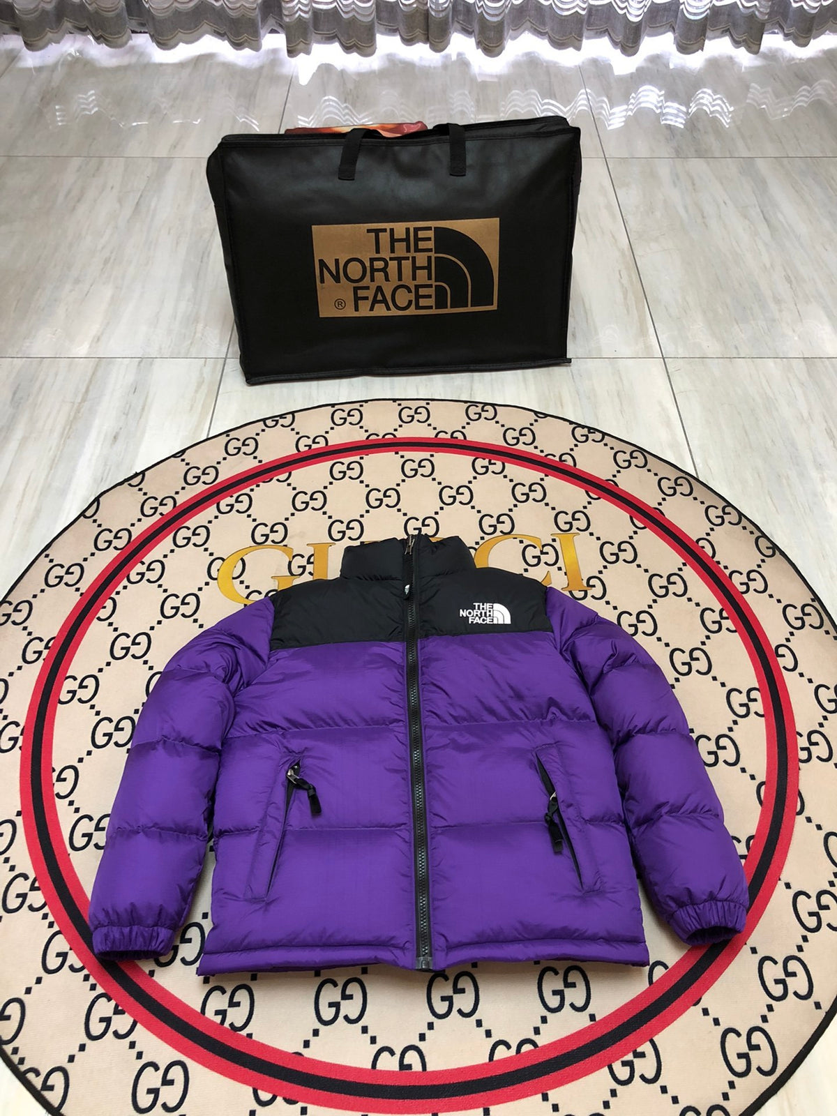 The North Face Purple and Black Stand-Collar Puffer Jacket