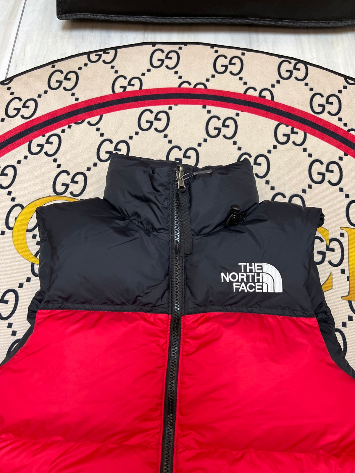 The North Face Red and Black Colorblock Puffer Vest
